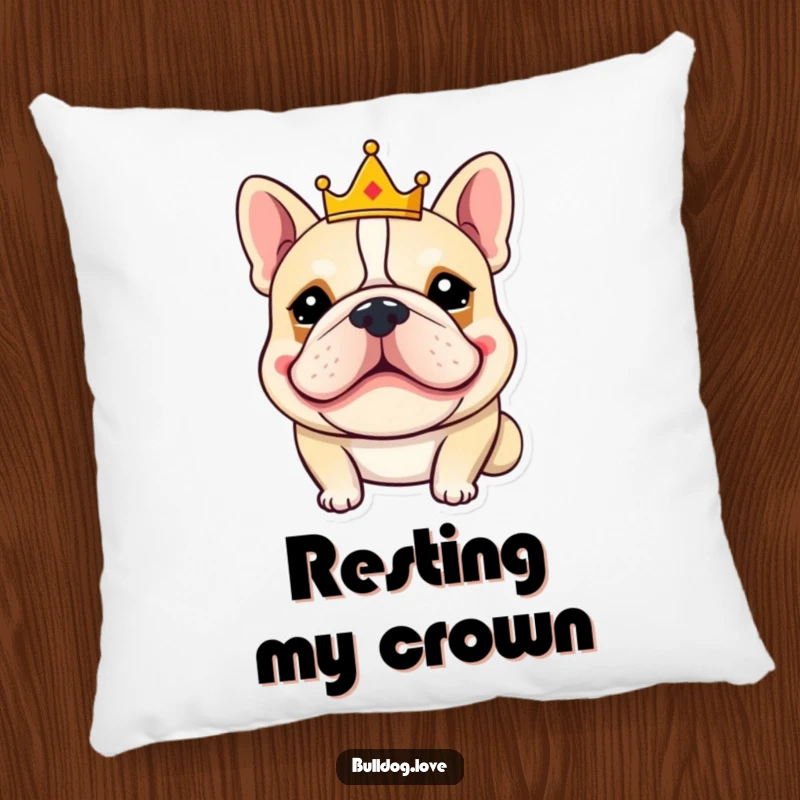 Funny bulldog pillow with a goofy-grinning bulldog wearing a small crown, offering both comfort and comical regal charm.