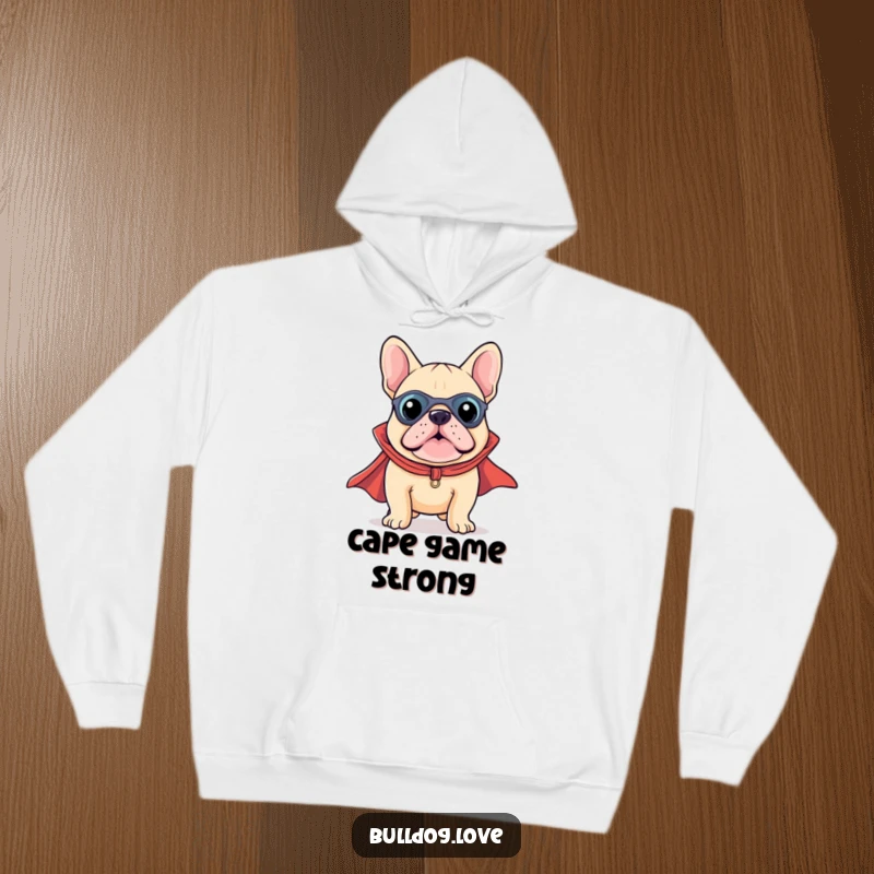 Funny Kawaii Bulldog Superhero Hoodie showing a brave little dog with a flowing cape, ready for adventure and cuddles.
