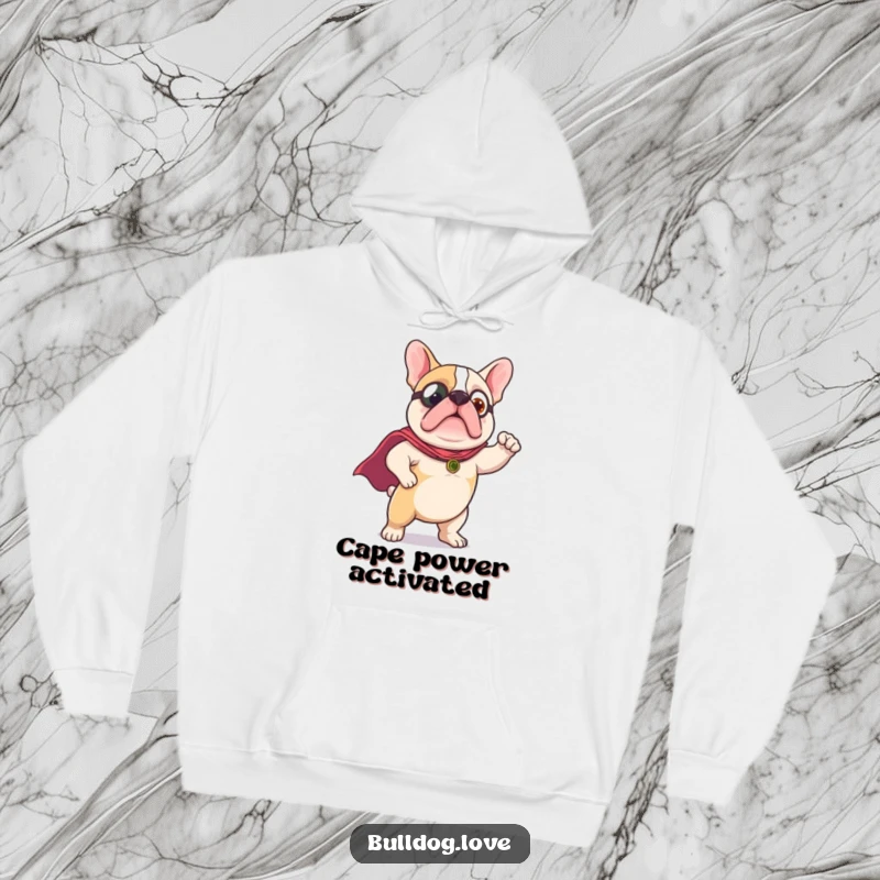 Funny Hoodie: A cute bulldog is illustrated wearing a small cape, striking a valiant and heroic pose.