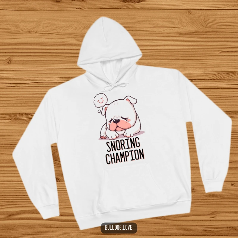 Funny hoodie featuring a sleepy bulldog softly snoring, with a happy dream bubble, embodying humorous comfort and relaxation.