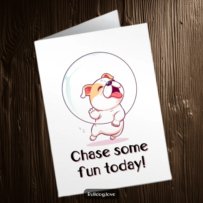 Funny Free Printable Birthday Card: An excited bulldog intensely chasing a large, shimmering bubble with great enthusiasm and playful focus.