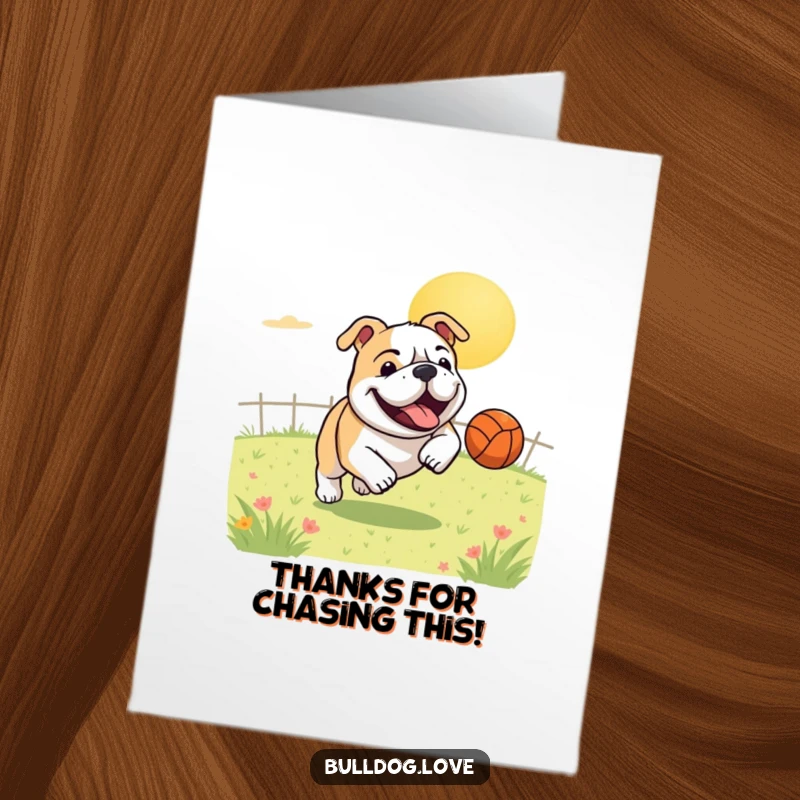 Funny free printable thank you card: a bulldog gleefully chasing a bouncing ball across a sunny field.