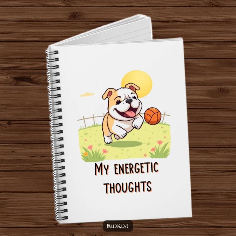 Funny notebook cover design with a gleeful bulldog joyfully chasing a bouncing ball in a sunny field, ready to capture your every thought.