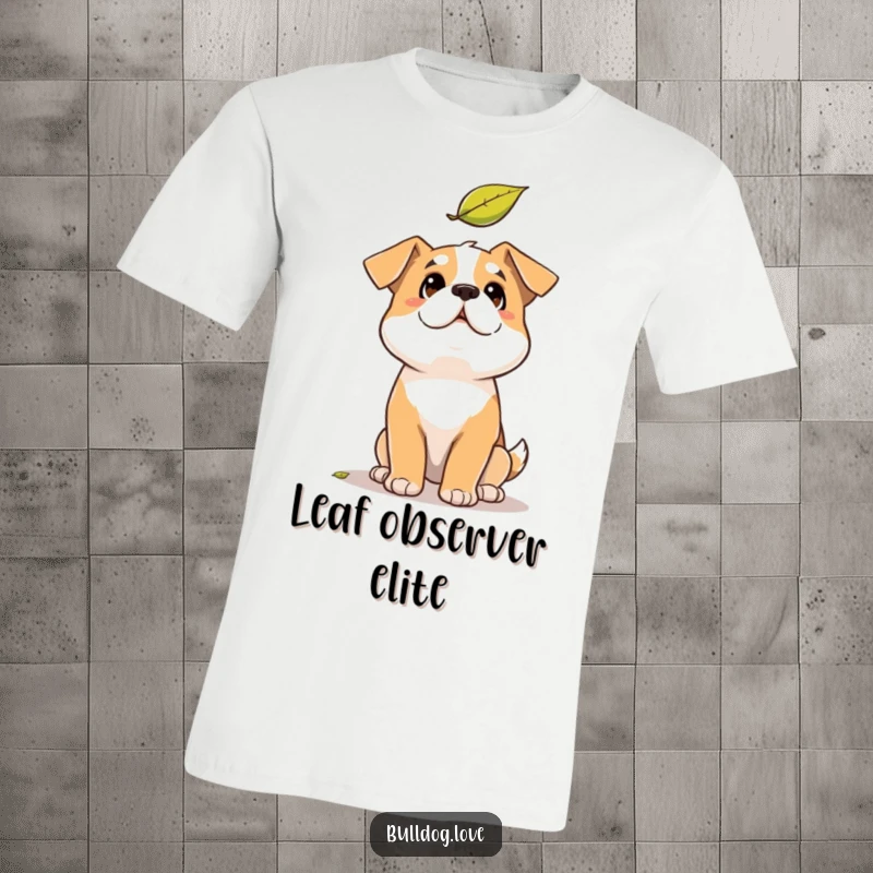 Funny Solid Dog T-Shirt: Dog with a solid build gazing upwards with a humorous expression at a descending leaf.