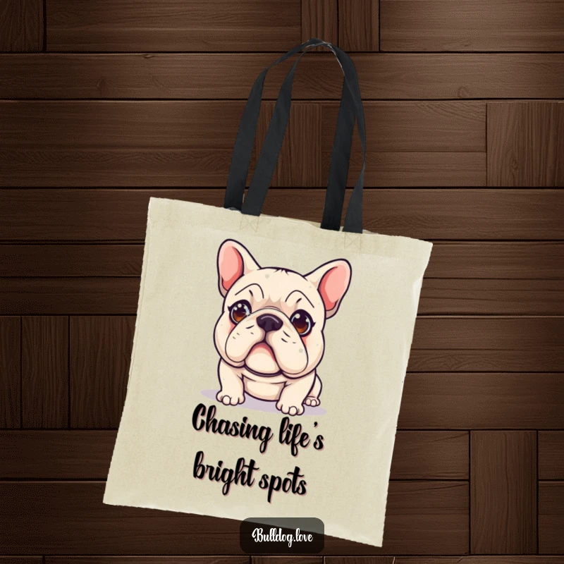 Funny Tote Bag featuring a cute bulldog with sparkling eyes, hilariously focused on chasing a red laser dot, perfect for dog lovers.