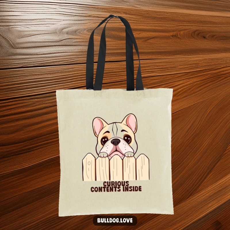 Funny bulldog peeking tote bag showcasing a dog peering over a fence with wide, curious eyes.